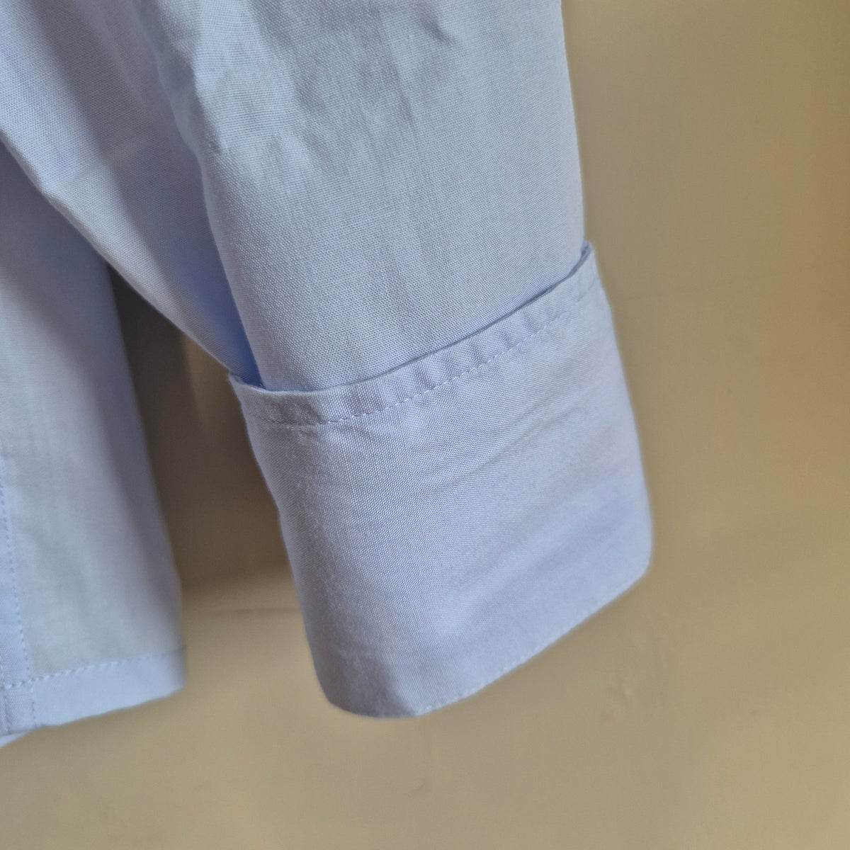 Pale blue shirt with ruffle collar : size M