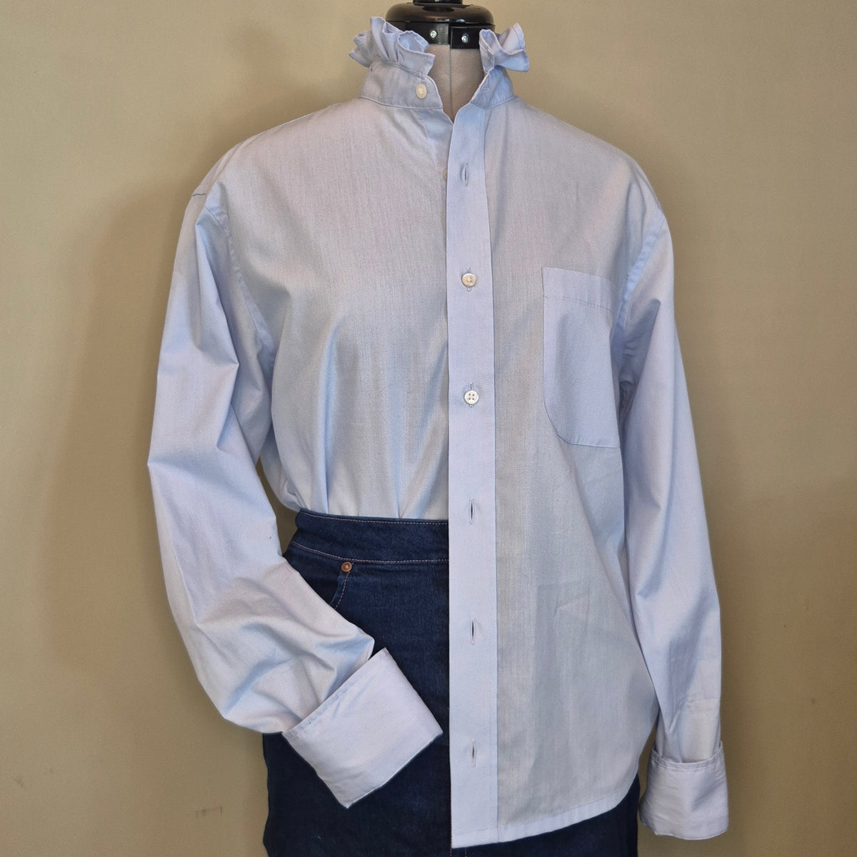 Pale blue shirt with ruffle collar : size M